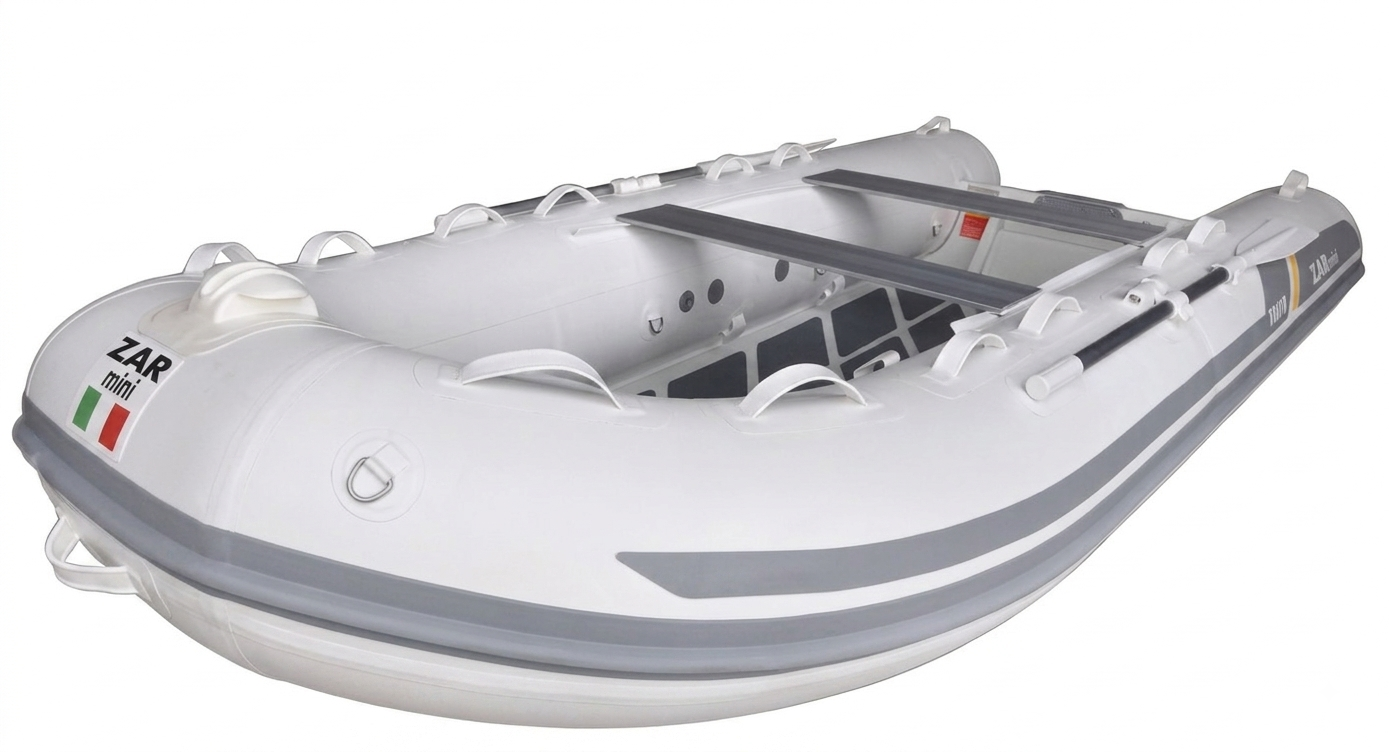 A white and gray inflatable dinghy boat with a cabin interior, shown on a plain white background. The brand name 'ZAR' is visible on the side along with a small Italian flag graphic.
