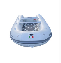 A white inflatable dinghy boat with a gray interior frame and a front logo reading 'ZAR mini' with a small Italian flag, shown on a plain white background.